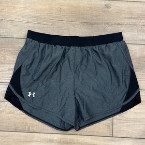 Under Armour size medium women’s heathered gray and black shorts